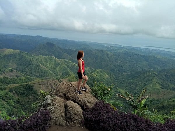 human nature | woman on mountain peak